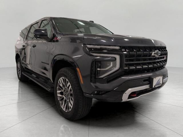 2025 Chevrolet Suburban Z71 in Dark Ash Metallic — front three-quarter view