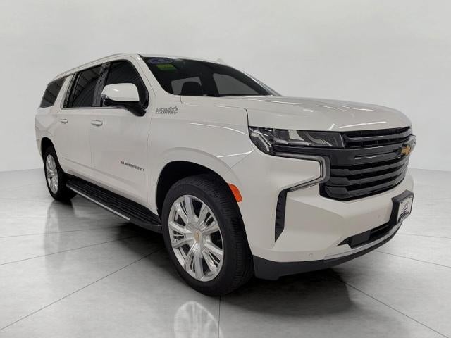 2023 Chevrolet Suburban High Country in Iridescent Pearl Tricoat — front three-quarter view