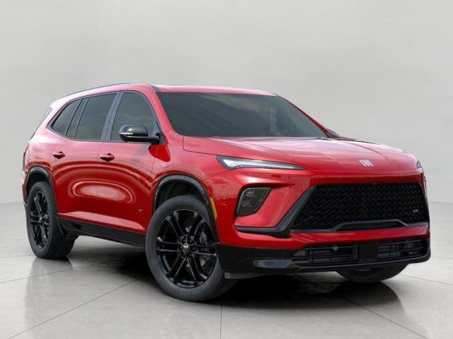 2026 Buick Enclave Sport Touring in Cherry Red Tintcoat — front three-quarter view