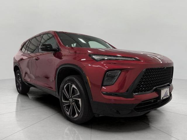 2026 Buick Enclave Sport Touring in Cherry Red Tintcoat — front three-quarter view