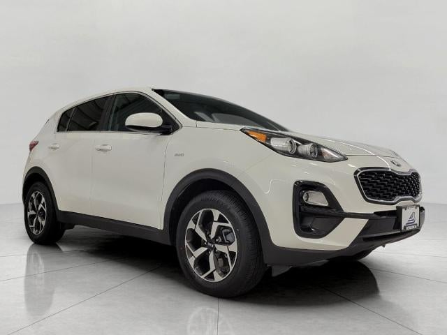 2018 Kia Sportage EX in White — front three-quarter view